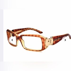 Miu Miu glam wrap sunglasses SMU036 2AU-3N1 125 3N